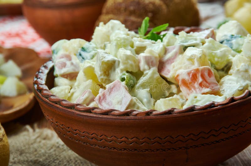 Rosols, Latvian Potato Salad, Latvian cuisine, Traditional assorted dishes, Top view. Rosols, Latvian Potato Salad, Latvian cuisine, Traditional assorted dishes, Top view.