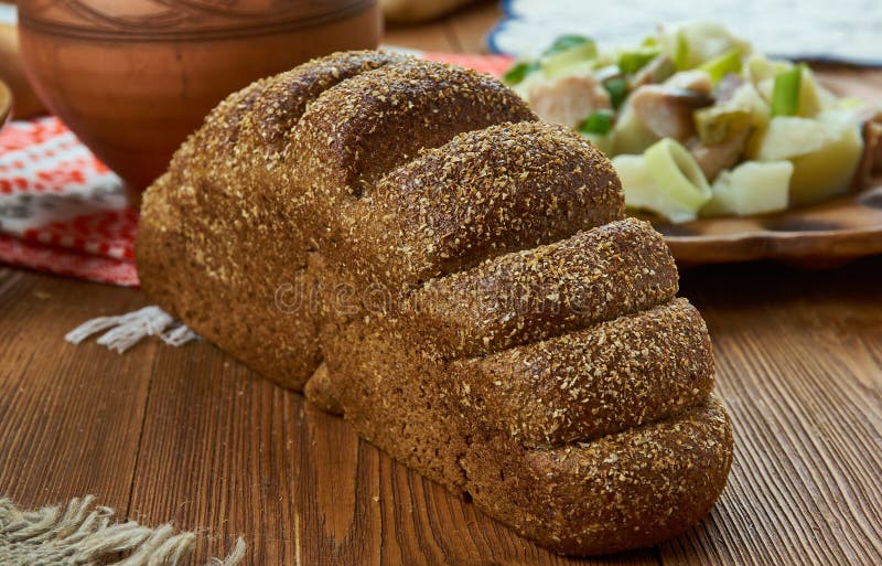 Rupjmaize, traditional dark bread , Latvian cuisine, Traditional assorted dishes, Top view. Rupjmaize, traditional dark bread , Latvian cuisine, Traditional assorted dishes, Top view.