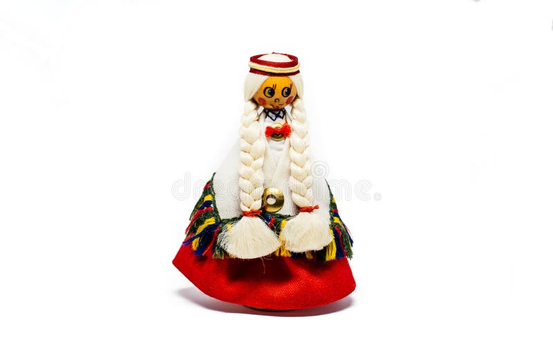 Latvian Traditional Costume Wooden Doll on white background. Latvian Traditional Costume Wooden Doll on white background