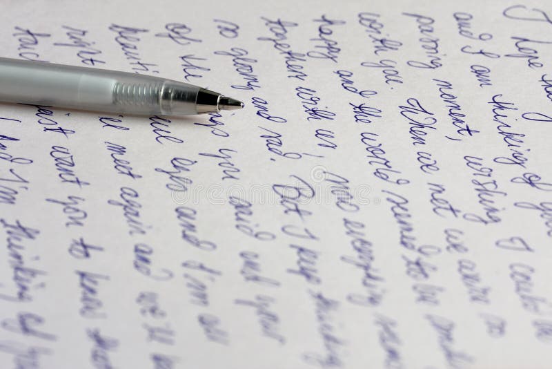 A handwritten love letter with a silver ballpoint pen. A handwritten love letter with a silver ballpoint pen.