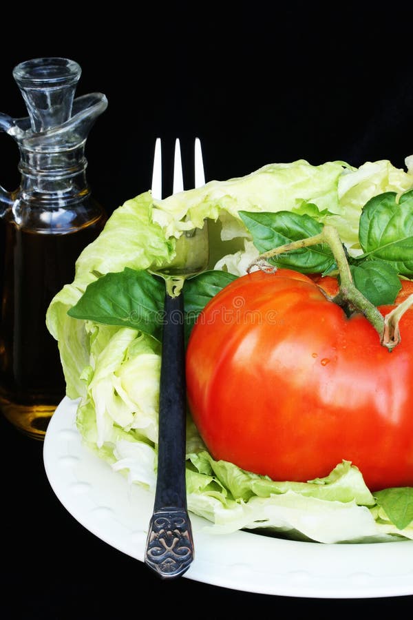 Lettuce and Tomato Salad stock image. Image of garden 10545743