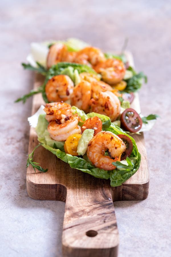 Lettuce Wrapped Shrimp Tacos with Fresh Tomato and Avocado Stock Image