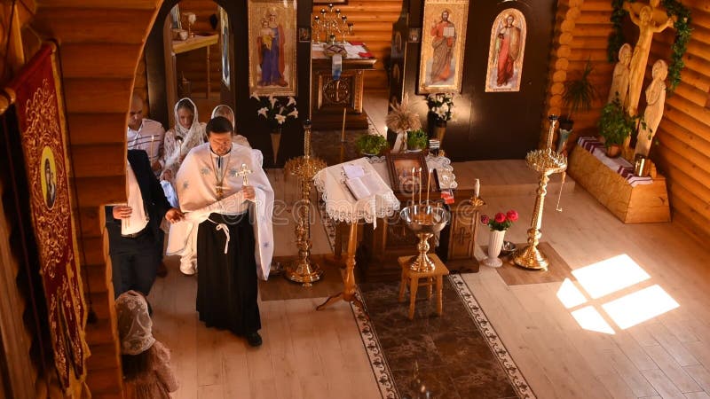 Letychiv, Ukraine - 10.15.2020: rite of sacrament epiphany child baby in church