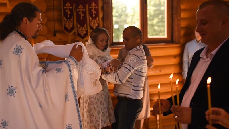 Letychiv, Ukraine - 10.15.2020: rite of sacrament epiphany child baby in church