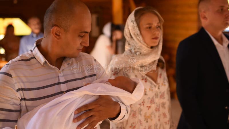 Letychiv, Ukraine - 10.15.2020: rite of sacrament epiphany child baby in church