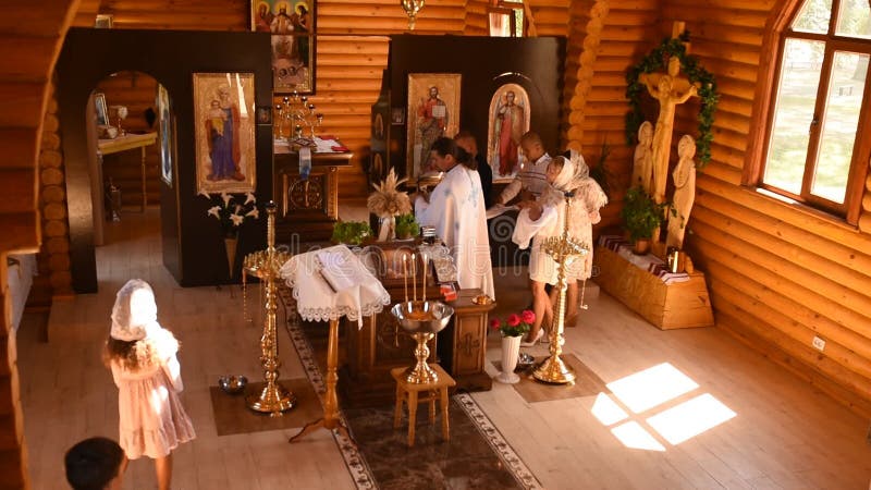 Letychiv, Ukraine - 10.15.2020: rite of sacrament epiphany child baby in church