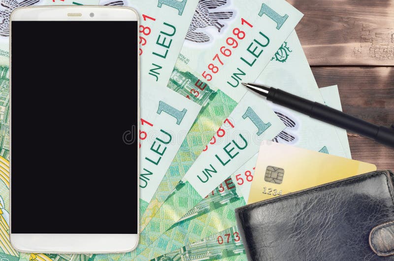 1 Romanian leu bills and smartphone with purse and credit card. E-payments or e-commerce concept. Online shopping and business with portable devices usage. 1 Romanian leu bills and smartphone with purse and credit card. E-payments or e-commerce concept. Online shopping and business with portable devices usage