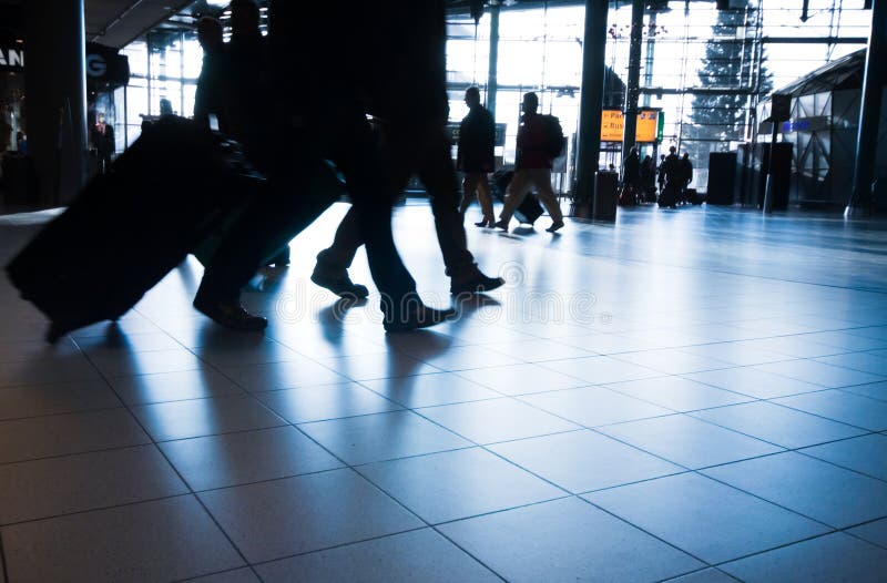 People traveling at the airport ( motion blur). People traveling at the airport ( motion blur)