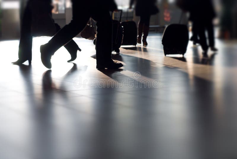 People traveling at the airport ( motion blur). People traveling at the airport ( motion blur)