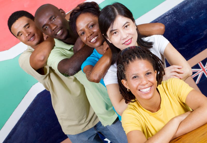 People unity: group of diversity people together, background is south african flag, 2010 fifa world cup concept. People unity: group of diversity people together, background is south african flag, 2010 fifa world cup concept