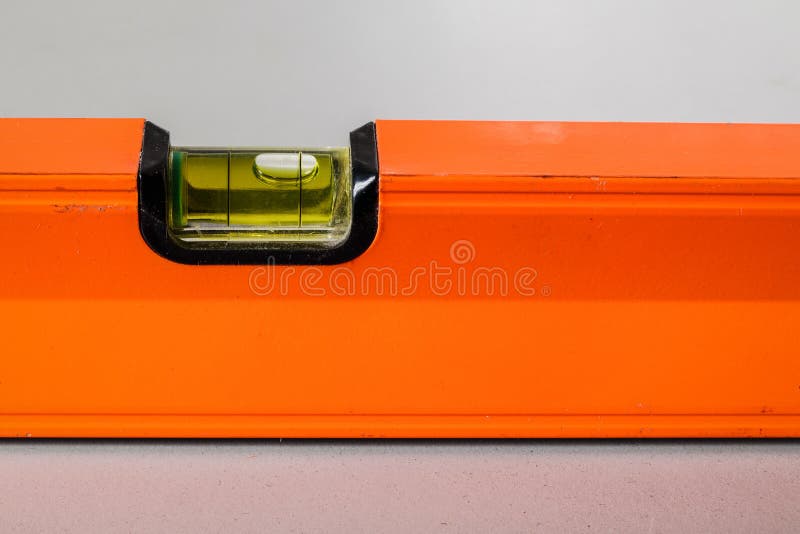 Level on a Sloping Surface. Bubble Level Indicates the Slope of the