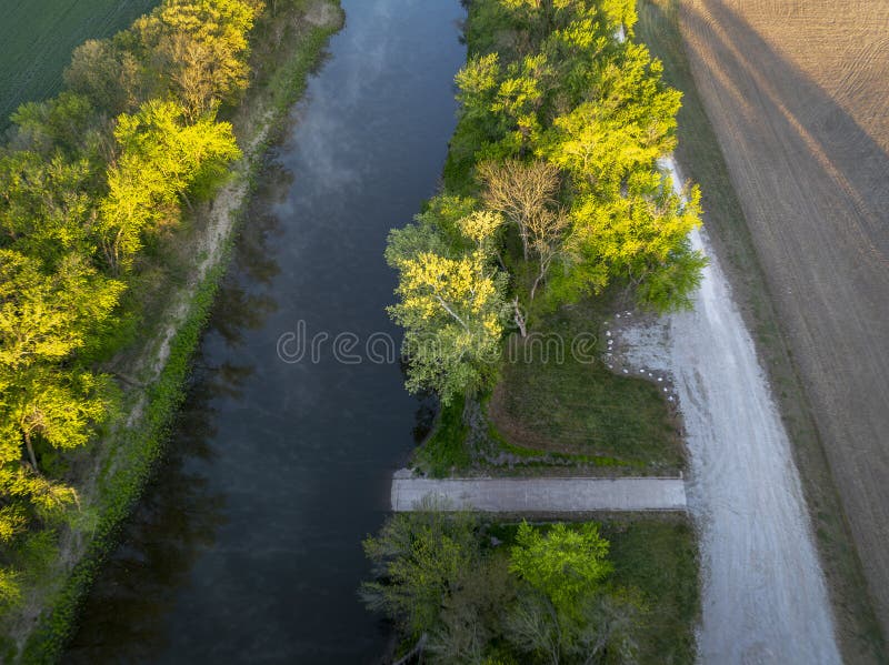 sunrise over boat ramp and the Lamine River at Roberts Bluff access in Missouri, springtime aerial view. sunrise over boat ramp and the Lamine River at Roberts Bluff access in Missouri, springtime aerial view