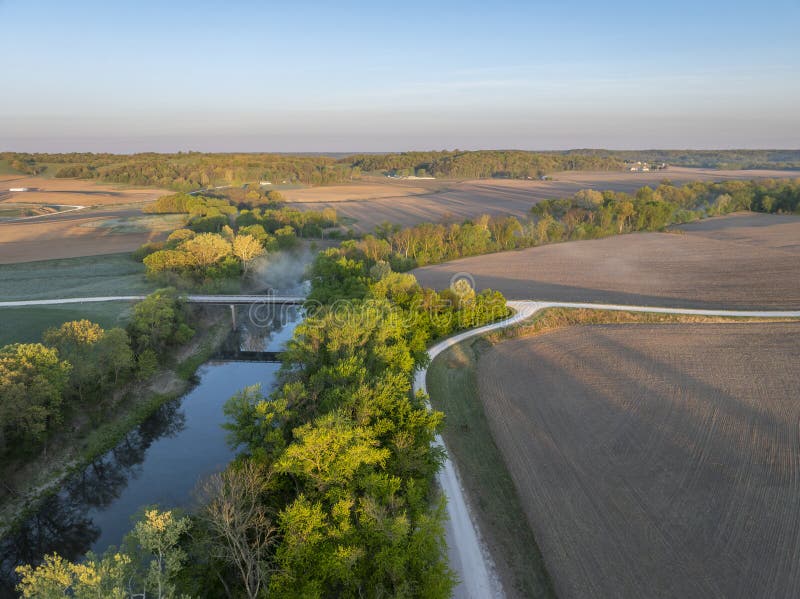 sunrise over farmland and the Lamine River at Roberts Bluff access in Missouri, springtime aerial view. sunrise over farmland and the Lamine River at Roberts Bluff access in Missouri, springtime aerial view