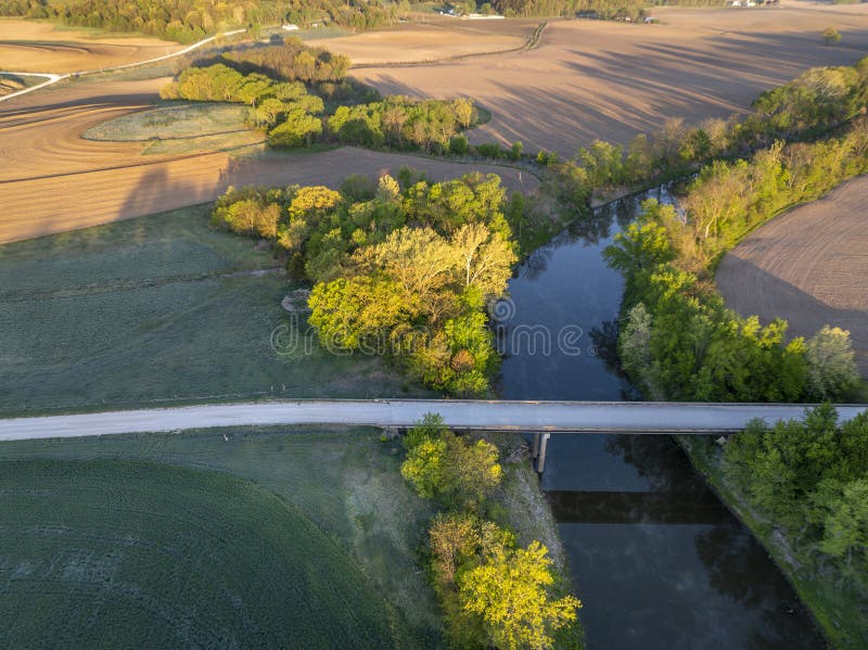 sunrise over farmland and the Lamine River at Roberts Bluff access in Missouri, springtime aerial view. sunrise over farmland and the Lamine River at Roberts Bluff access in Missouri, springtime aerial view