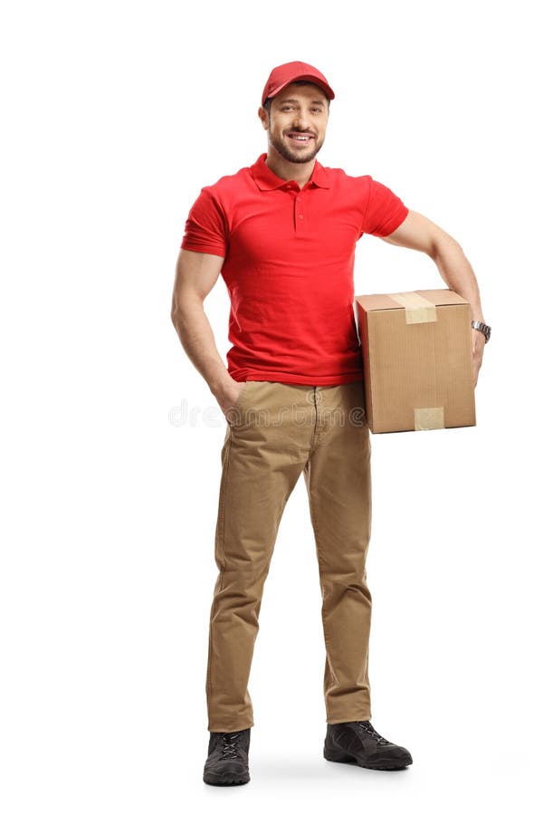 Full length portrait of a delivery guy holding a cardboard box isolated on white background. Full length portrait of a delivery guy holding a cardboard box isolated on white background