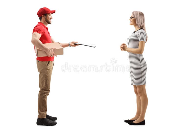 Full length profile shot of a delivery men handing over a package to a young women isolated on white background. Full length profile shot of a delivery men handing over a package to a young women isolated on white background