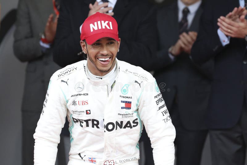 Lewis Hamilton of Mercedes AMG Petronas Motorsport celebrates on the podium after  the F1 Grand Prix of Monaco