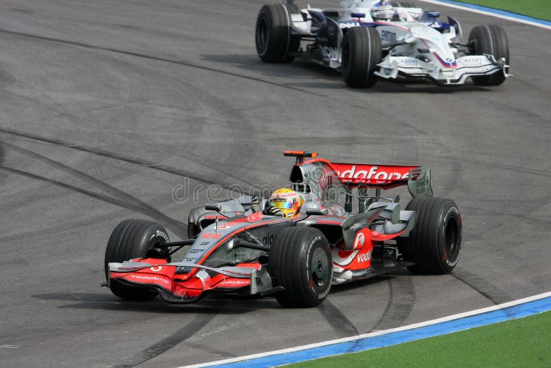 Lewis Hamilton at the Sepang International Circuit (Malaysia) in the second F1 race of 2008 season. View of the McLaren Mercedes car from the side. Lewis Hamilton at the Sepang International Circuit (Malaysia) in the second F1 race of 2008 season. View of the McLaren Mercedes car from the side