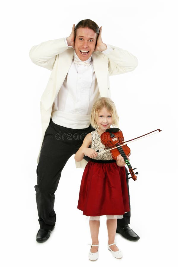 Father or tearcher and five year old daughter in formal wear; child with violin. Father or tearcher and five year old daughter in formal wear; child with violin.