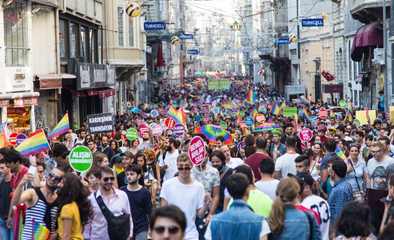 ISTANBUL, TURKEY - JUNE 29, 2014: 22. LGBTI Pride March held in Istiklal Avenue, Istanbul. Tens of thousands of people gathered to celebrate LGBT Honor week. ISTANBUL, TURKEY - JUNE 29, 2014: 22. LGBTI Pride March held in Istiklal Avenue, Istanbul. Tens of thousands of people gathered to celebrate LGBT Honor week.