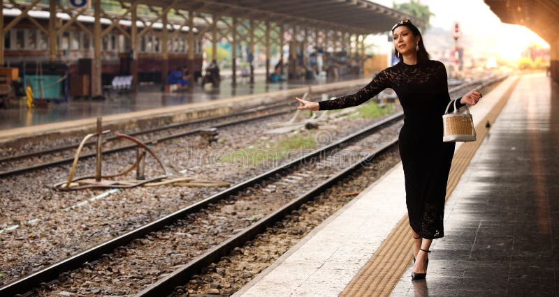 LGBT Transgender Model Travels on Train at Station Railway Stock Photo ...