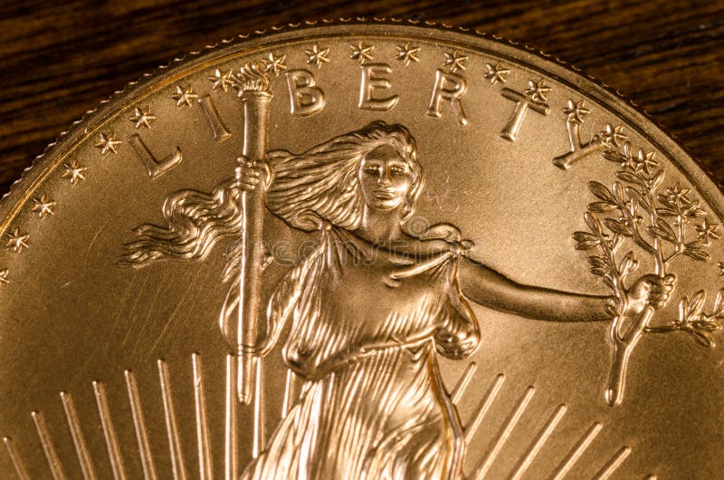 Liberity (ord) på Förenta staterna som går Liberty Gold Coin arkivfoton