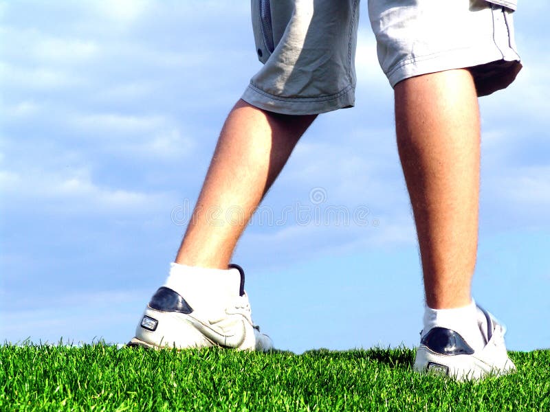 Naming and classifying this photo is hard. It was taken at a golf course on a tall grass mound. This was originally taken as a sporting shot (a person prepare for a golf swing, his feet are in the swing stance), but it has many more adaptations. The smooth grass tones and bright blue sky were just too much to resist. You can use this image for numerous ideas: success, freedom, rising above the occasion, peace etc. etc. Naming and classifying this photo is hard. It was taken at a golf course on a tall grass mound. This was originally taken as a sporting shot (a person prepare for a golf swing, his feet are in the swing stance), but it has many more adaptations. The smooth grass tones and bright blue sky were just too much to resist. You can use this image for numerous ideas: success, freedom, rising above the occasion, peace etc. etc.