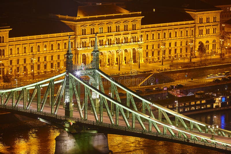 Liberty iron bridge. Danube river in Budapest. Corvinus College. Hungary