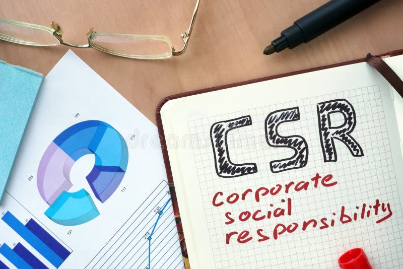 Libreta con concepto de la responsabilidad social corporativa de la palabra CSR fotografía de archivo libre de regalías Libreta con concepto de la responsabilidad social corporativa de la palabra CSR fotografía de archivo libre de regalías