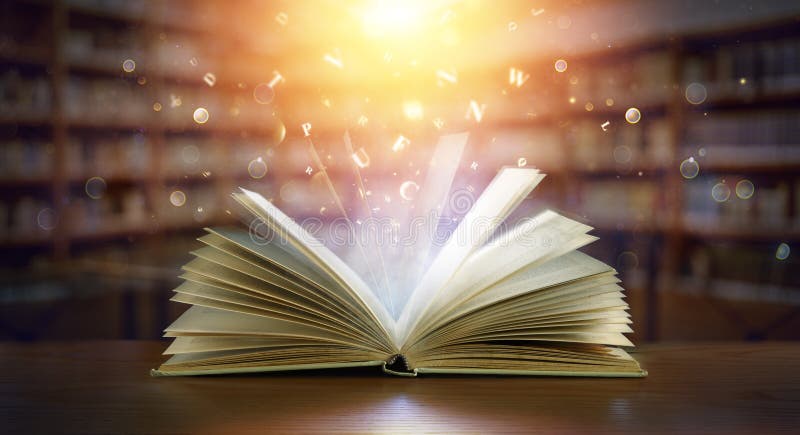 Book With Magic Lights And Bright Letters In Defocused Modern Library. Book With Magic Lights And Bright Letters In Defocused Modern Library
