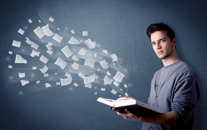 Casual young man holding book with pages flying out of it. Casual young man holding book with pages flying out of it