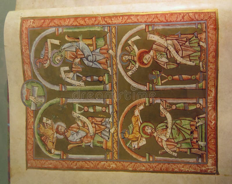 Libro medievale con un'illustrazione di quattro evangelisti fotografia stock Libro medievale con un'illustrazione di quattro evangelisti fotografia stock