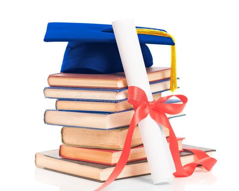 Libros con el casquillo y el diploma de la graduación fotografía de archivo libre de regalías Libros con el casquillo y el diploma de la graduación fotografía de archivo libre de regalías