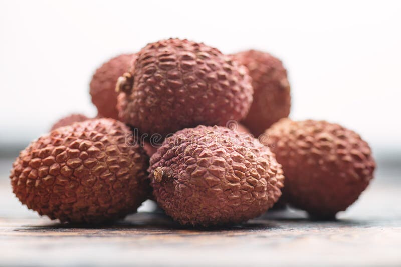 Lichee on wooden table, litchi, lychee fruit detail