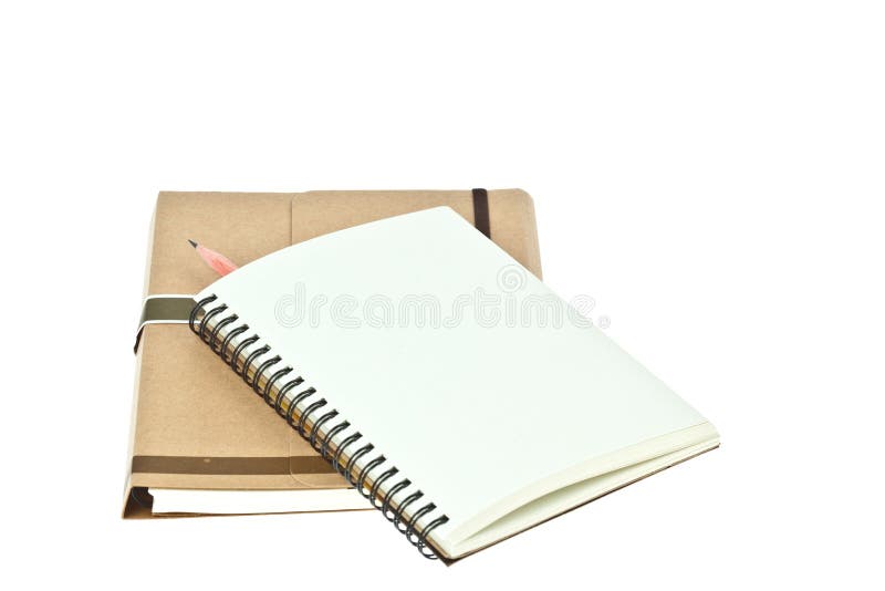 Lichtcrème kleurig notitieboek en potlood royalty-vrije stock foto