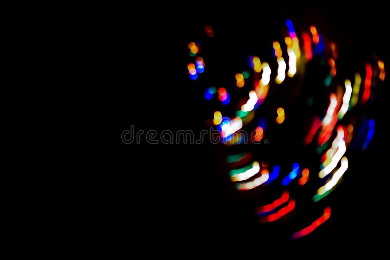 Lichte droomachtige lichtbron voor het schilderen van de bokeh - structuur op een zwarte achtergrond royalty-vrije stock foto Lichte droomachtige lichtbron voor het schilderen van de bokeh - structuur op een zwarte achtergrond royalty-vrije stock foto