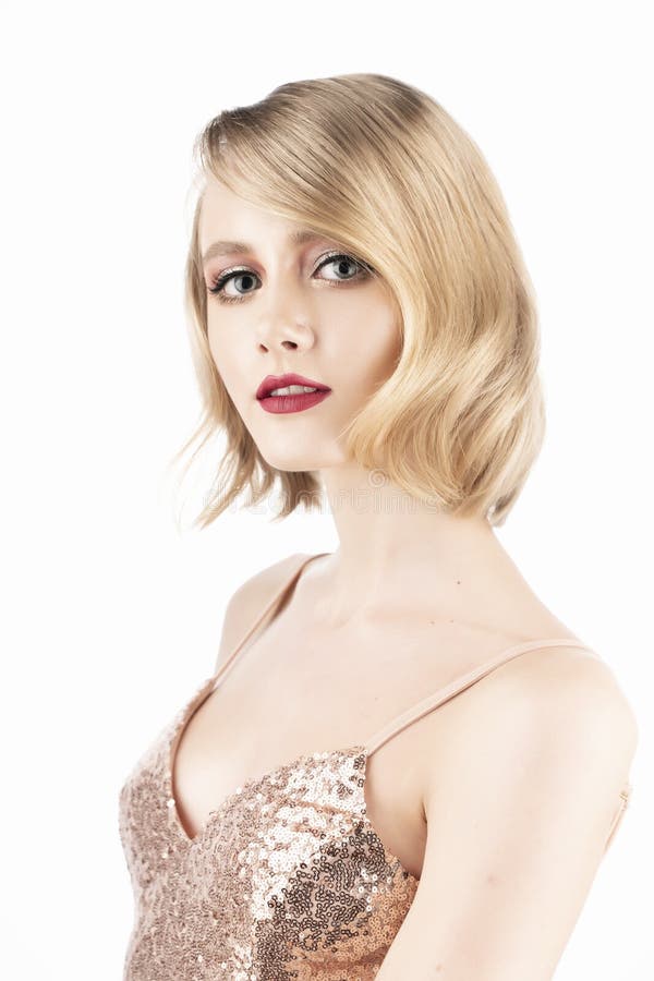 Cute Face Blonde Girl With Vintage Style Hairstyle Wearing A Golden Sparkling Dress And Black