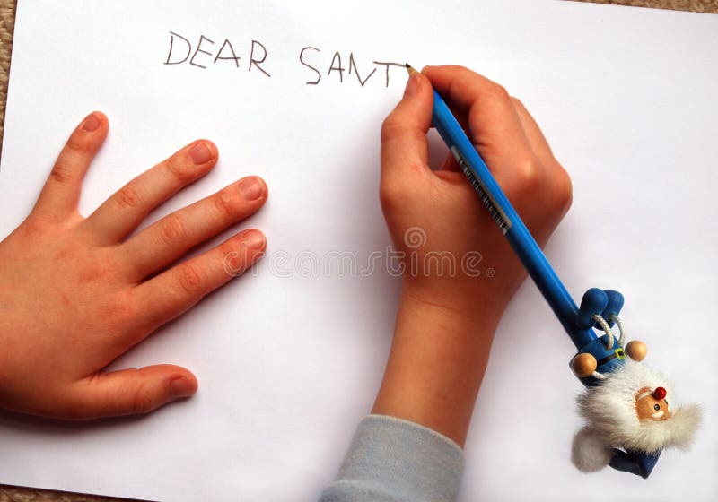 Letter to Santa, written by little boy with blue funny pencil. Letter to Santa, written by little boy with blue funny pencil