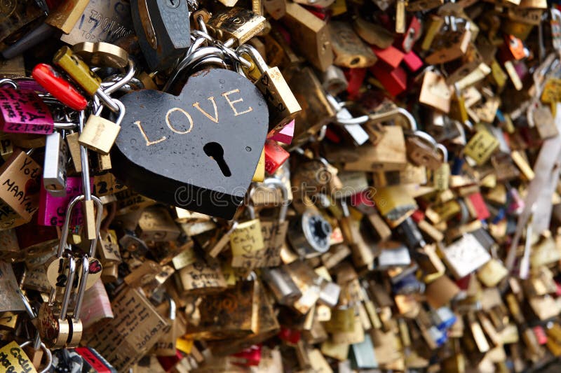 Multiple locks on The Bridge of Arts in Paris (Pont des Arts) also known as The Bridge of Kisses. Multiple locks on The Bridge of Arts in Paris (Pont des Arts) also known as The Bridge of Kisses