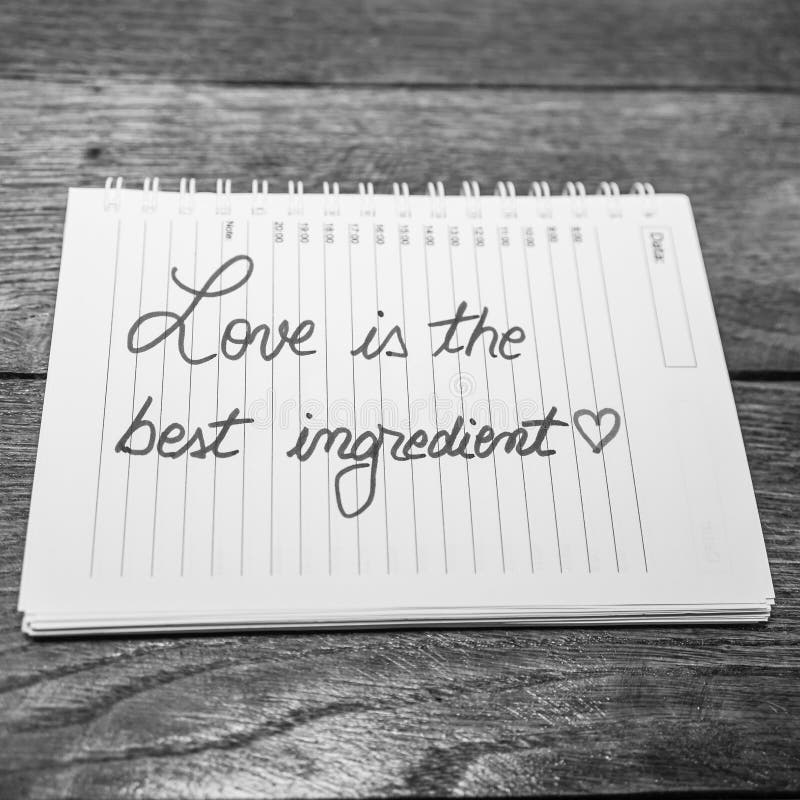 Love is the best ingredient, writing love text on paper, lovely message. Text on spiral agenda. Romantic, love concept. Valentine`s day. Love is the best ingredient, writing love text on paper, lovely message. Text on spiral agenda. Romantic, love concept. Valentine`s day.