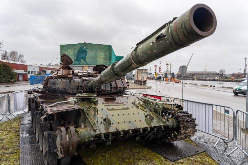 Liepaja, Latvia - 04.01.2023: Russian T-72B tank, destroyed by the Ukrainian army in the spring of 2022 in the battles near Kiev. Liepaja, Latvia - 04.01.2023: Russian T-72B tank, destroyed by the Ukrainian army in the spring of 2022 in the battles near Kiev.