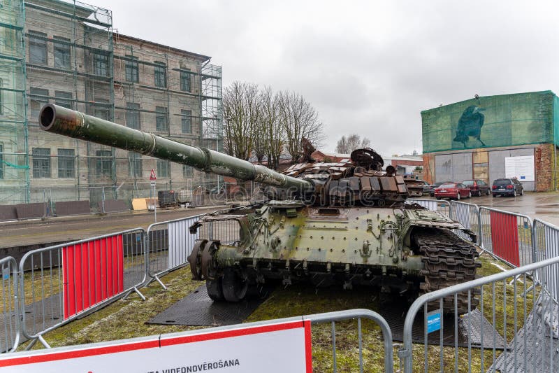 Liepaja, Latvia - 04.01.2023: Russian T-72B tank, destroyed by the Ukrainian army in the spring of 2022 in the battles near Kiev. Liepaja, Latvia - 04.01.2023: Russian T-72B tank, destroyed by the Ukrainian army in the spring of 2022 in the battles near Kiev.