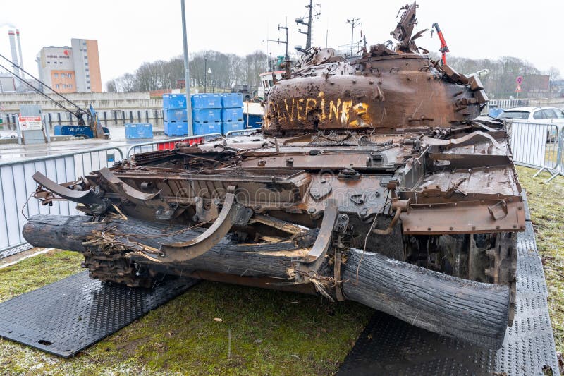 Liepaja, Latvia - 04.01.2023: Russian T-72B tank, destroyed by the Ukrainian army in the spring of 2022 in the battles near Kiev. Liepaja, Latvia - 04.01.2023: Russian T-72B tank, destroyed by the Ukrainian army in the spring of 2022 in the battles near Kiev.