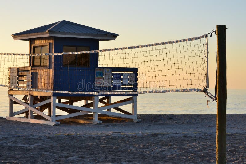 A life guard hut at Venice Beach Fl. with volley ball net in view. A life guard hut at Venice Beach Fl. with volley ball net in view
