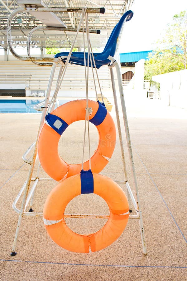 Yellow Life Preserver Floating Swimming Pool Summer Background Stock