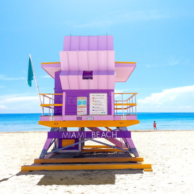 Stock photo of a lifeguard station in Miami Beach. Photo with a life guard looking to the sea. Photo taken in a summer sunny day