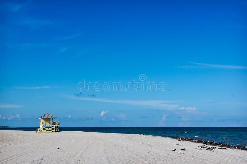 Lifeguard tower on the white sand beach