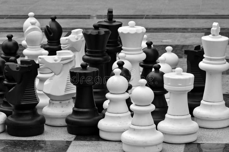 Life Size Chess Pieces On A Board Outside At A Hotel Pool Side Stock Photo  - Download Image Now - iStock