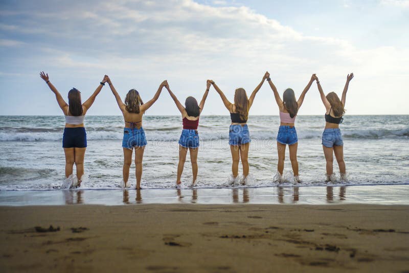 Lifestyle back portrait of young group of Asian Korean and Chinese women , happy and attractive girlfriends enjoying Summer holida royalty free stock photo Lifestyle back portrait of young group of Asian Korean and Chinese women , happy and attractive girlfriends enjoying Summer holida royalty free stock photo