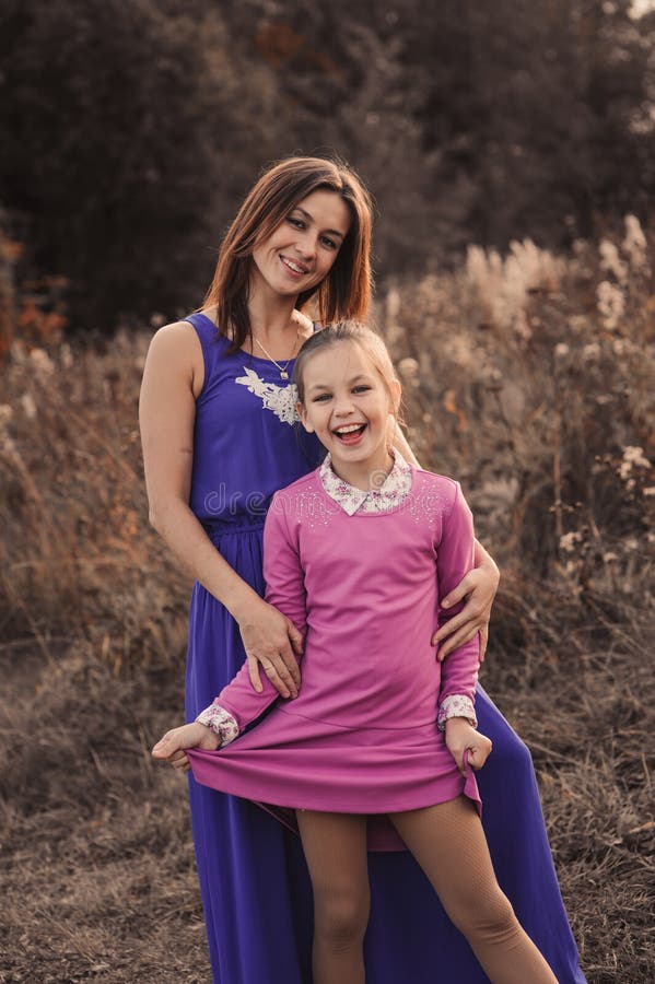 Lifestyle Capture Of Happy Mother And Preteen Daughter Having Fun ...